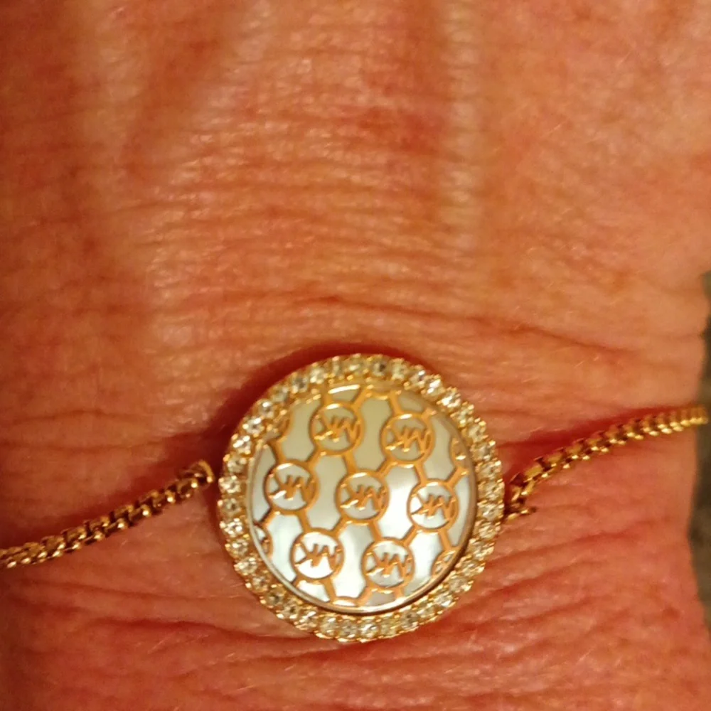 Michael Kors rose gold rhinestone zip bracelet